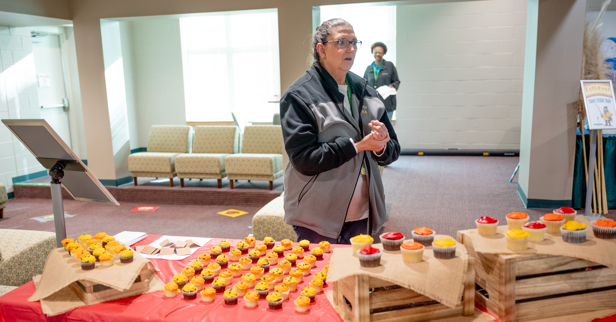 Fall Fest: Myra with cupcakes for the cake walk