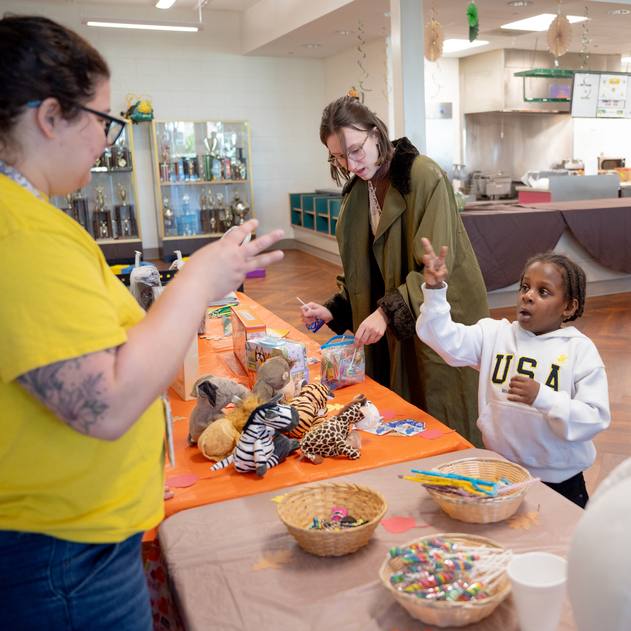Fall Fest: An elementary student barters tickets with Abigail