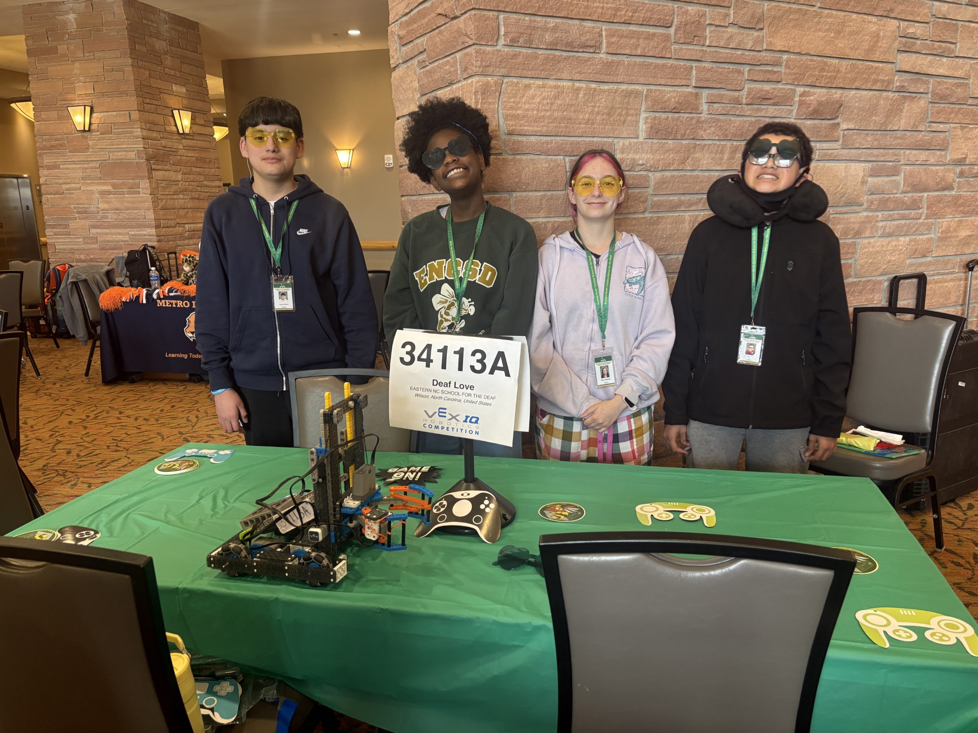 Middle School Robotics Team and their competition robot